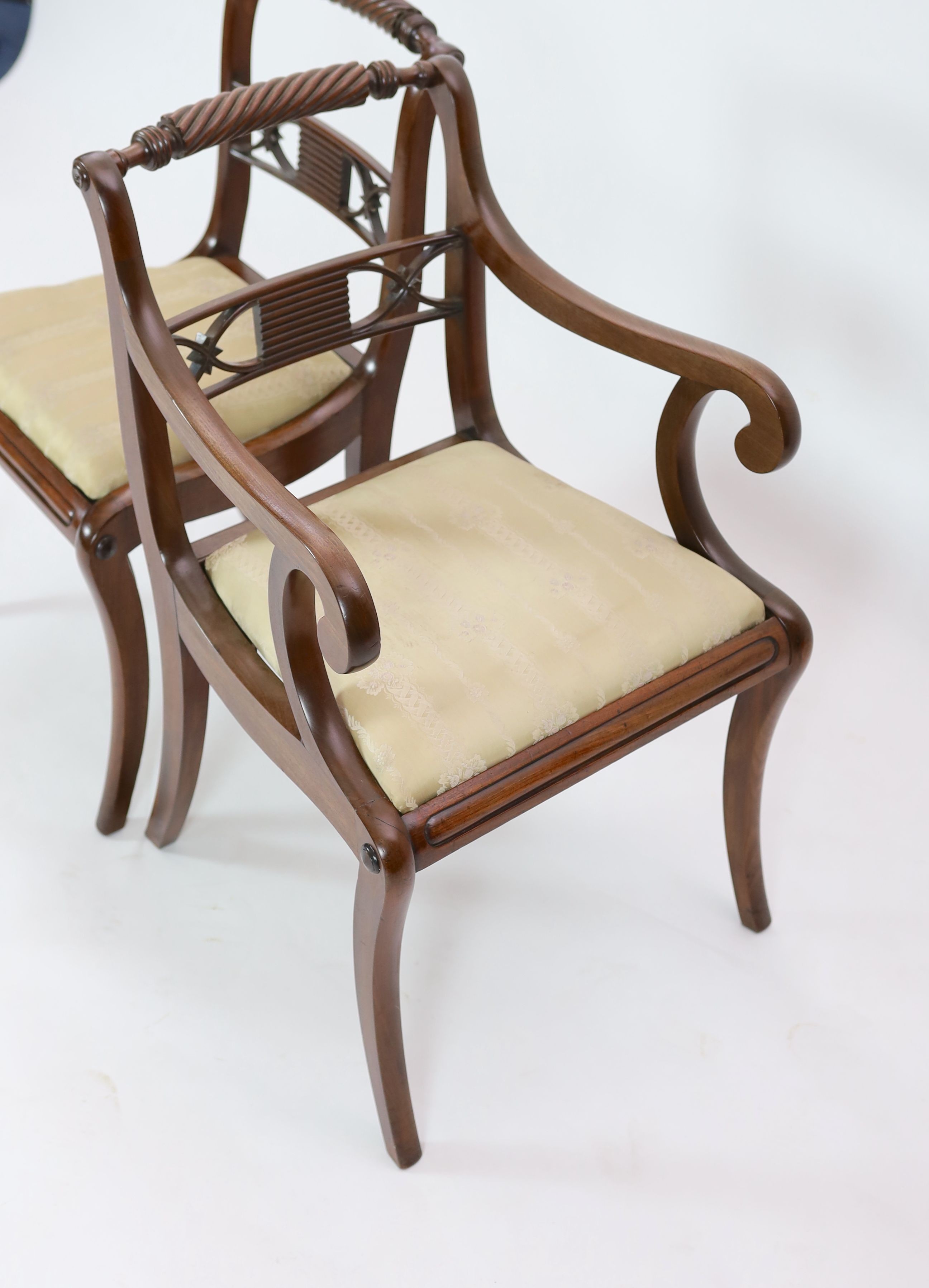A set of eight Regency mahogany dining chairs, including two carvers, carvers W.54cm D.56cm H.84cm